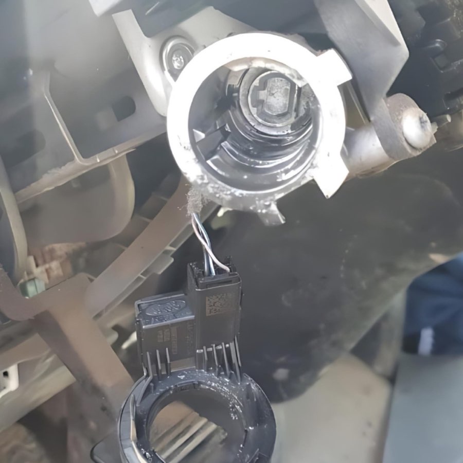 Ignition barrel removed from a steering column during a repair
