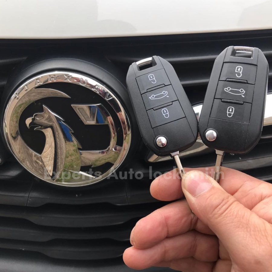 Replacement car key being cut in the mobile workshop